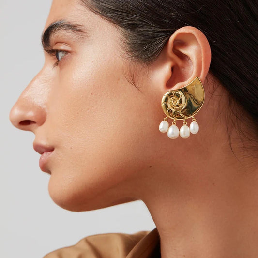 "Gold Shell-Inspired Stud Earrings with pearl Dangling Accents"