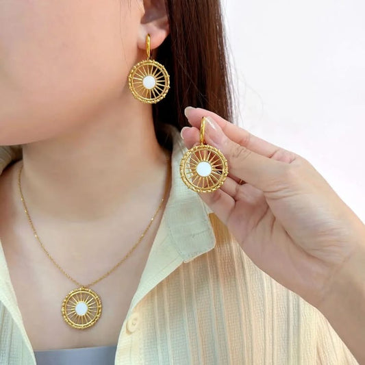 Golden spoke drop Earrings - radiate elegance with every turn