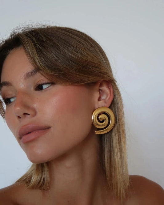 Twist of gold : Sculpture Swirl Hoops
