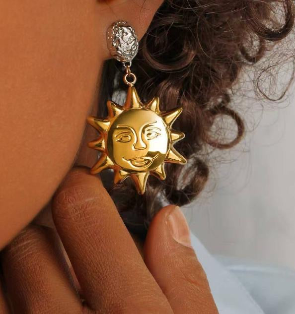 Sun shaped gold & silver earrings