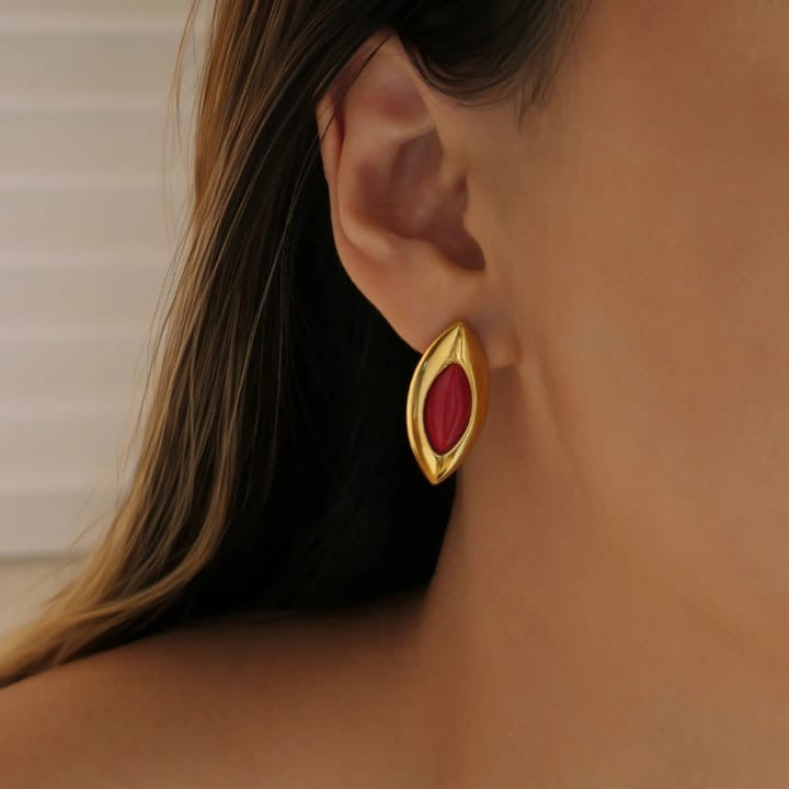 'Crimson Marquise: Gold Framed Elegance'